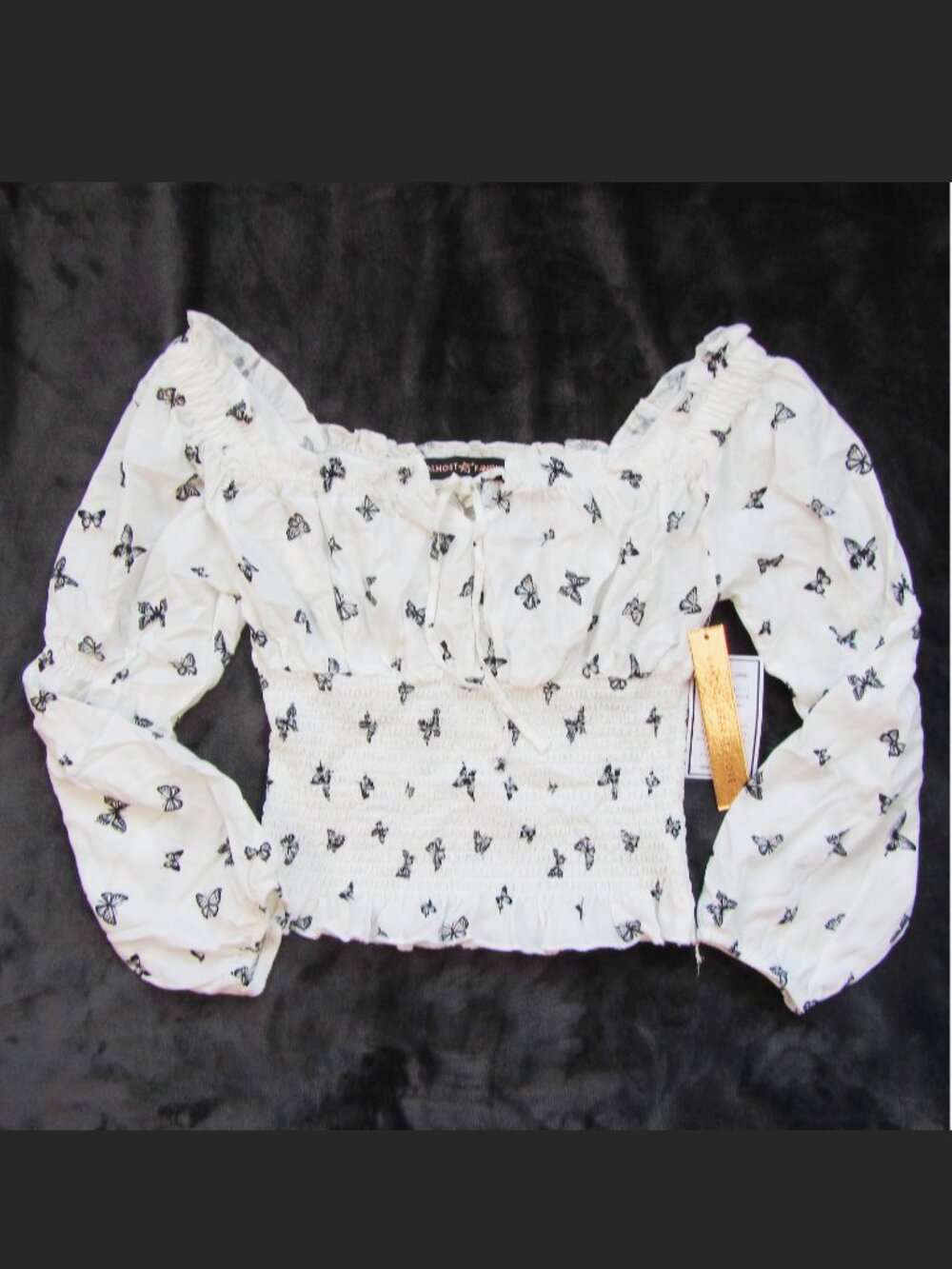 Almost Famous White Smocked Blouse with Black Butterfly Print